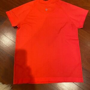 Lululemon Relaxed Fit Flame Red Swiftly Tee. Woman’s Size 4 Great Condition.